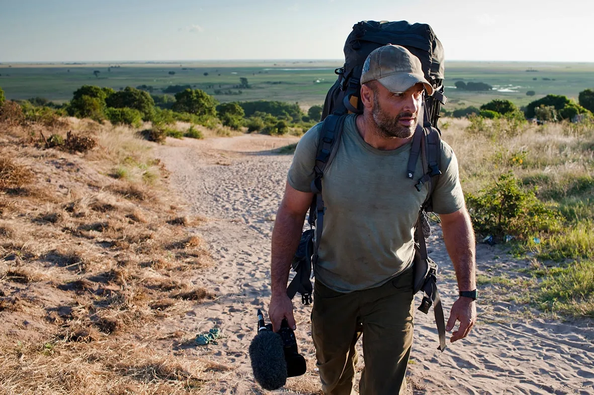 Ed Stafford publicity portrait on a dirt road, Zimbabwe