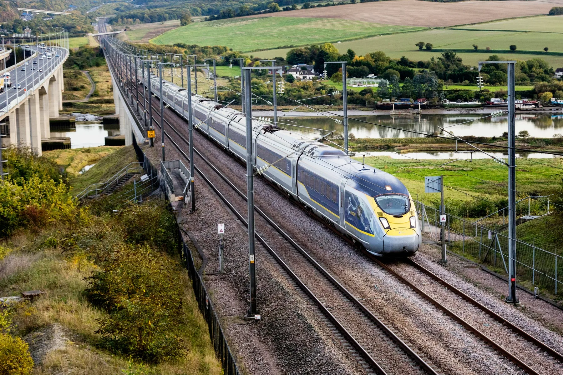 Eurostar 'greener way' sustainability advertising over green countryside