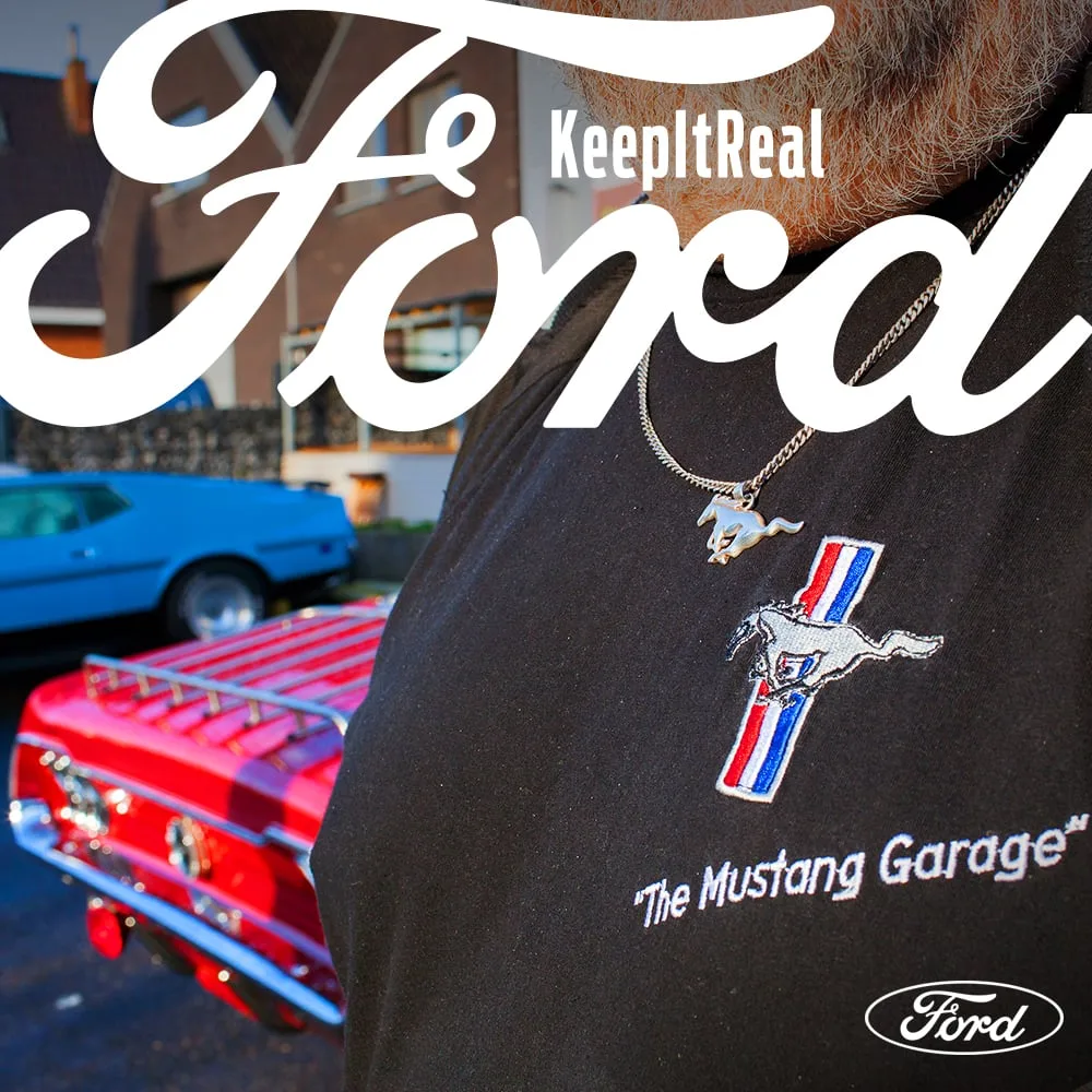 Albert Engier in his 'Mustang Garage' shirt beside his Ford Mustang — 'Keep It Real'