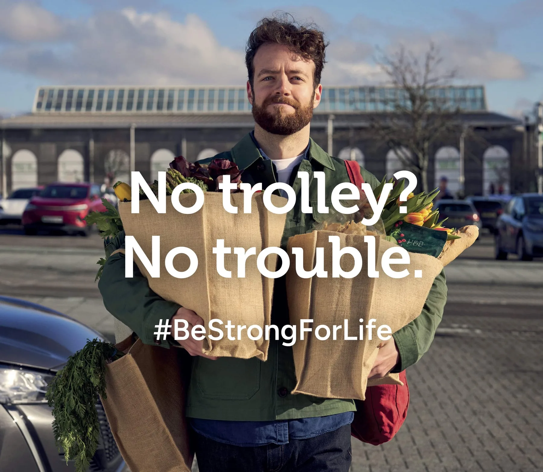 Holland & Barrett #BeStrongForLife campaign, a shopper with jute bags of veg