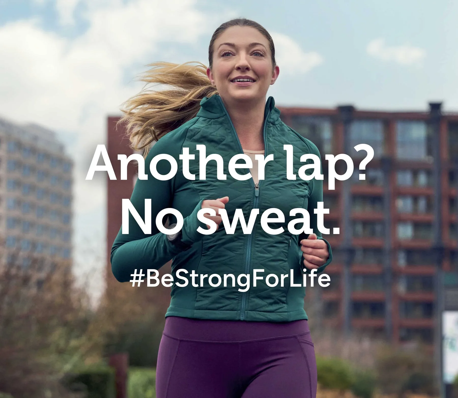 A woman running in the city, Holland & Barrett #BeStrongForLife