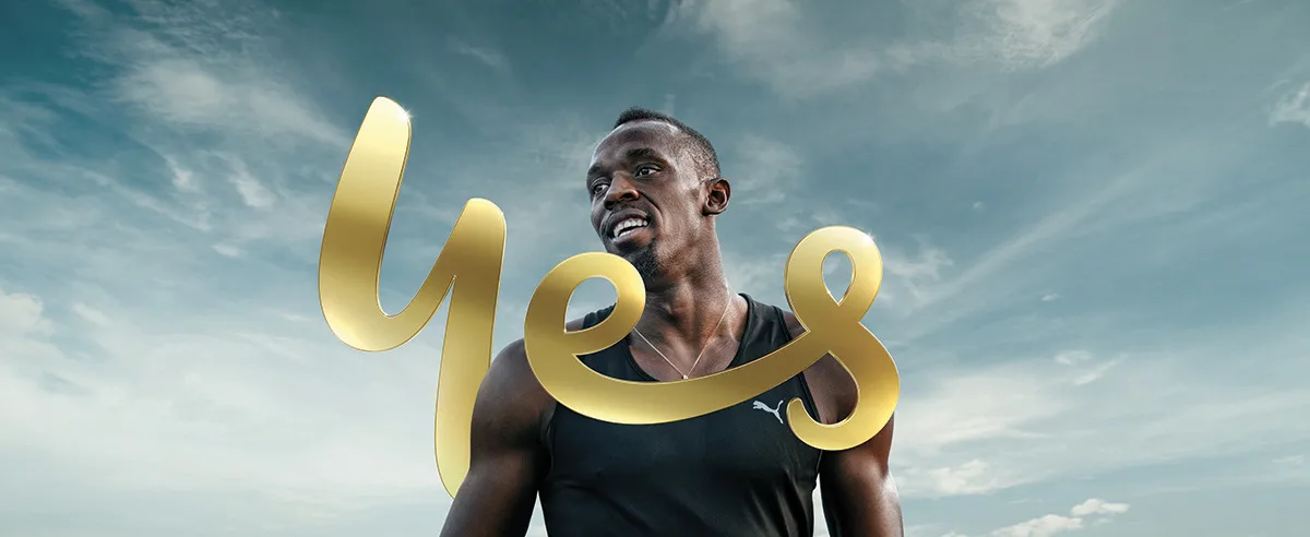 Usain Bolt beneath a golden 'Yes' for the Optus network campaign