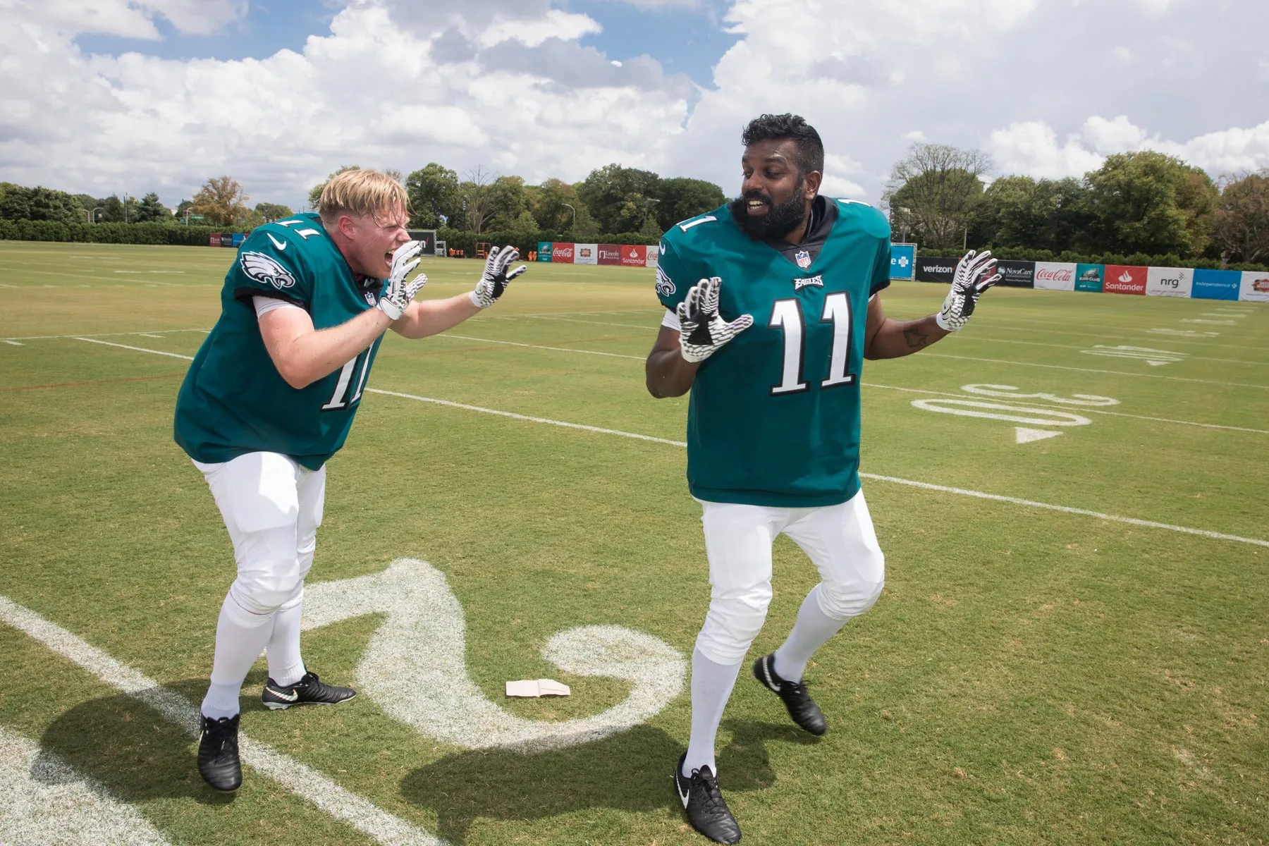 Rob Beckett and Romesh Ranganathan psyching each other up in Eagles kit at Philadelphia training camp — Sky 'Rob & Romesh Vs'